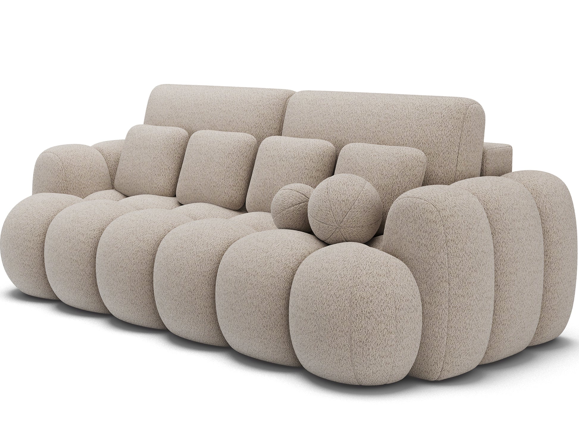 Sofa Cotonn Royal 18 beżowa – designerska, nowoczesna sofa w kolorze jasnobeżowym, widok z prawego skosu, ozdobne poduszki i kule.