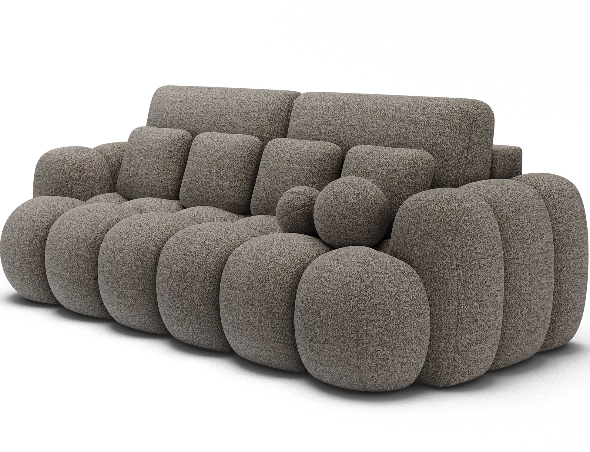 Sofa Cotonn Royal 20 w kolorze beżowym – widok skośny na designerski model z charakterystycznymi poduchami i zaokrąglonymi kształtami.