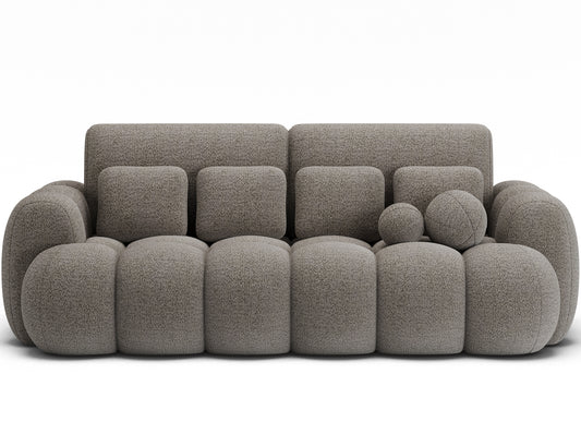 Sofa Cotonn Royal 20 w kolorze beżowym, ujęcie na wprost – nowoczesna forma i miękka, pikowana struktura.
