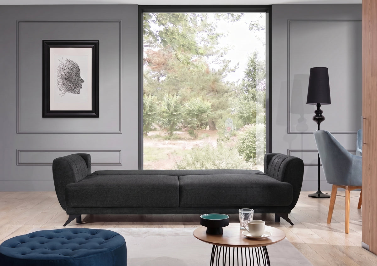 Sofa Megis w czarnej tkaninie Inari 100 w nowoczesnej aranżacji salonu