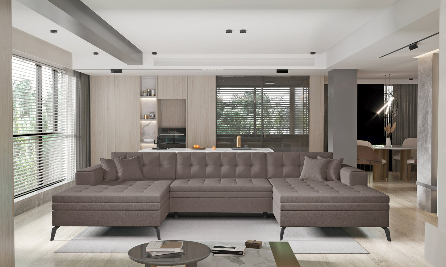 Beżowa sofa narożna Vertizo wykonana z materiału Savoi 7 doskonale sprawdzi się w nowoczesnym salonie, oferując wygodne siedziska, miękkie poduszki oraz uniwersalny wygląd pasujący do różnych aranżacji wnętrz