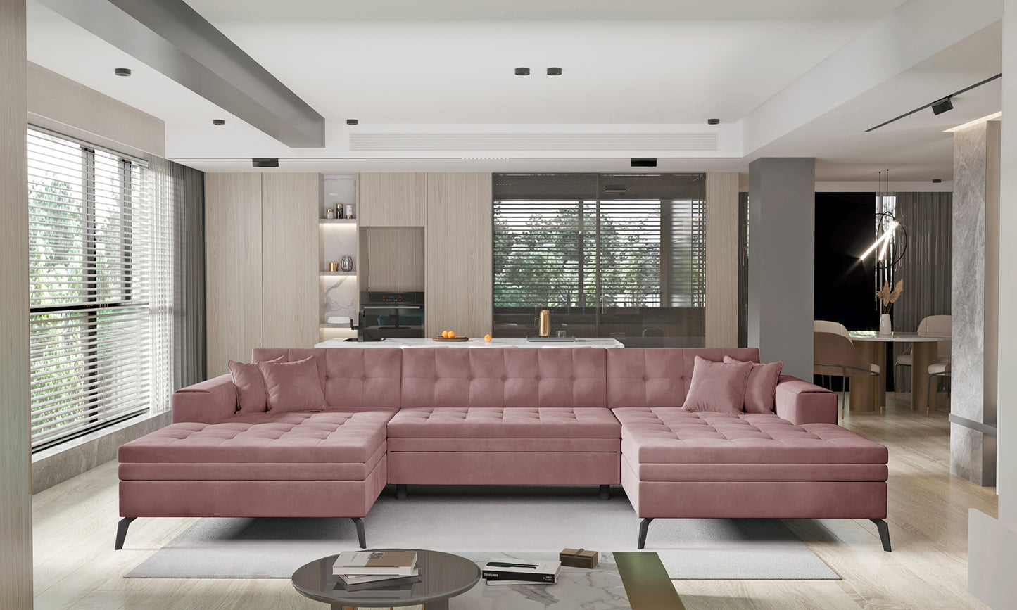 Różowa sofa narożna Vertizo wykonana z przyjemnej w dotyku tkaniny Velvetmat 24 doskonale sprawdzi się jako wygodny mebel do salonu, łącząc funkcjonalność z dekoracyjnym charakterem i subtelną elegancją