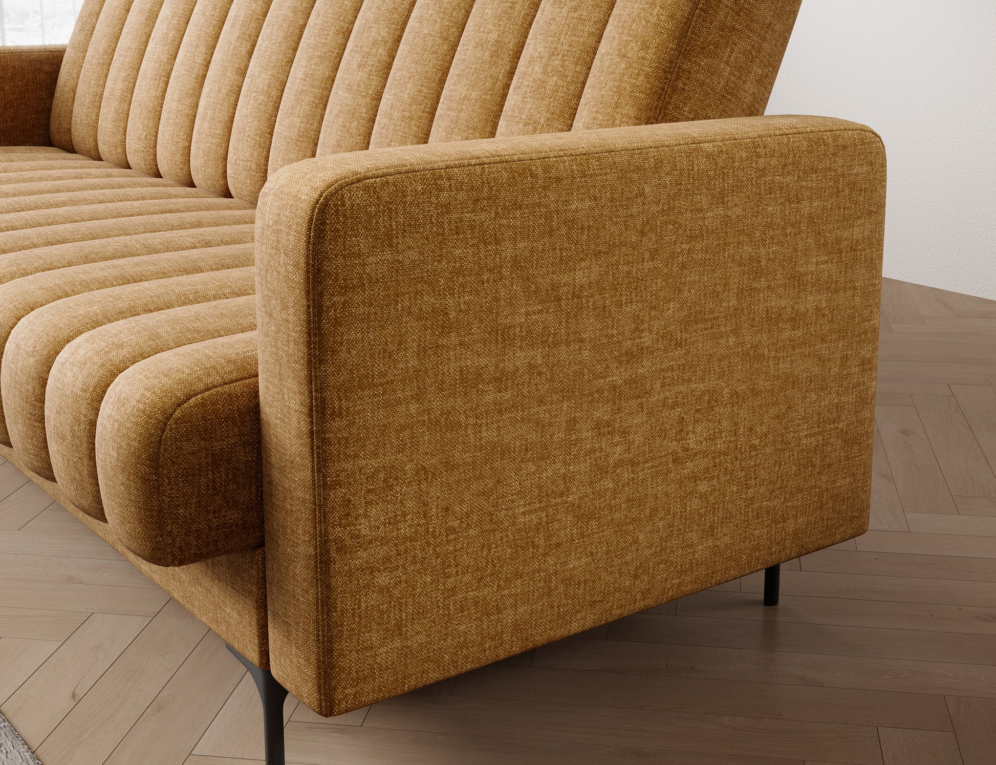 Zaokrąglony podłokietnik wersalki Roneyy Manhattan 45 żółtej – komfortowy i estetyczny detal pasujący do nowoczesnych wnętrz.