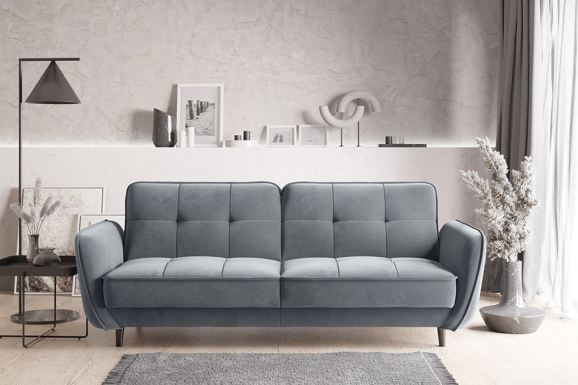 Jasnoszara sofa rozkładana Bellis z funkcją spania w aranżacji salonu