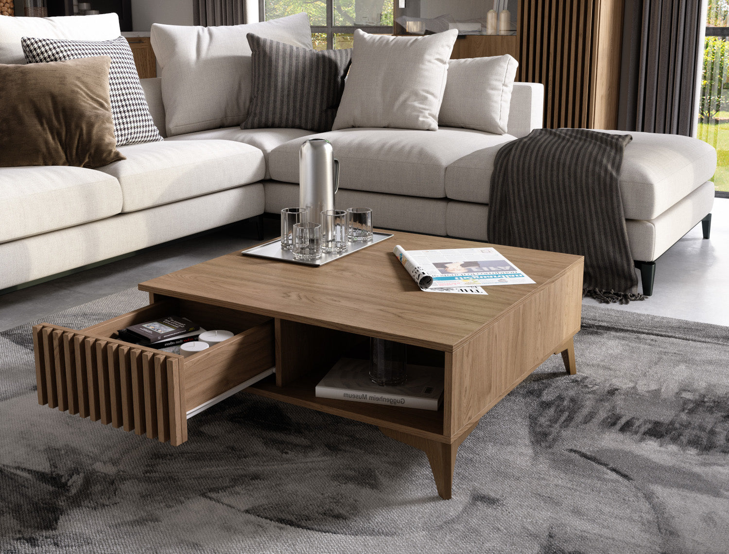 Stolik kawowy Entsian w aranżacji salonu z sofą i dywanem.