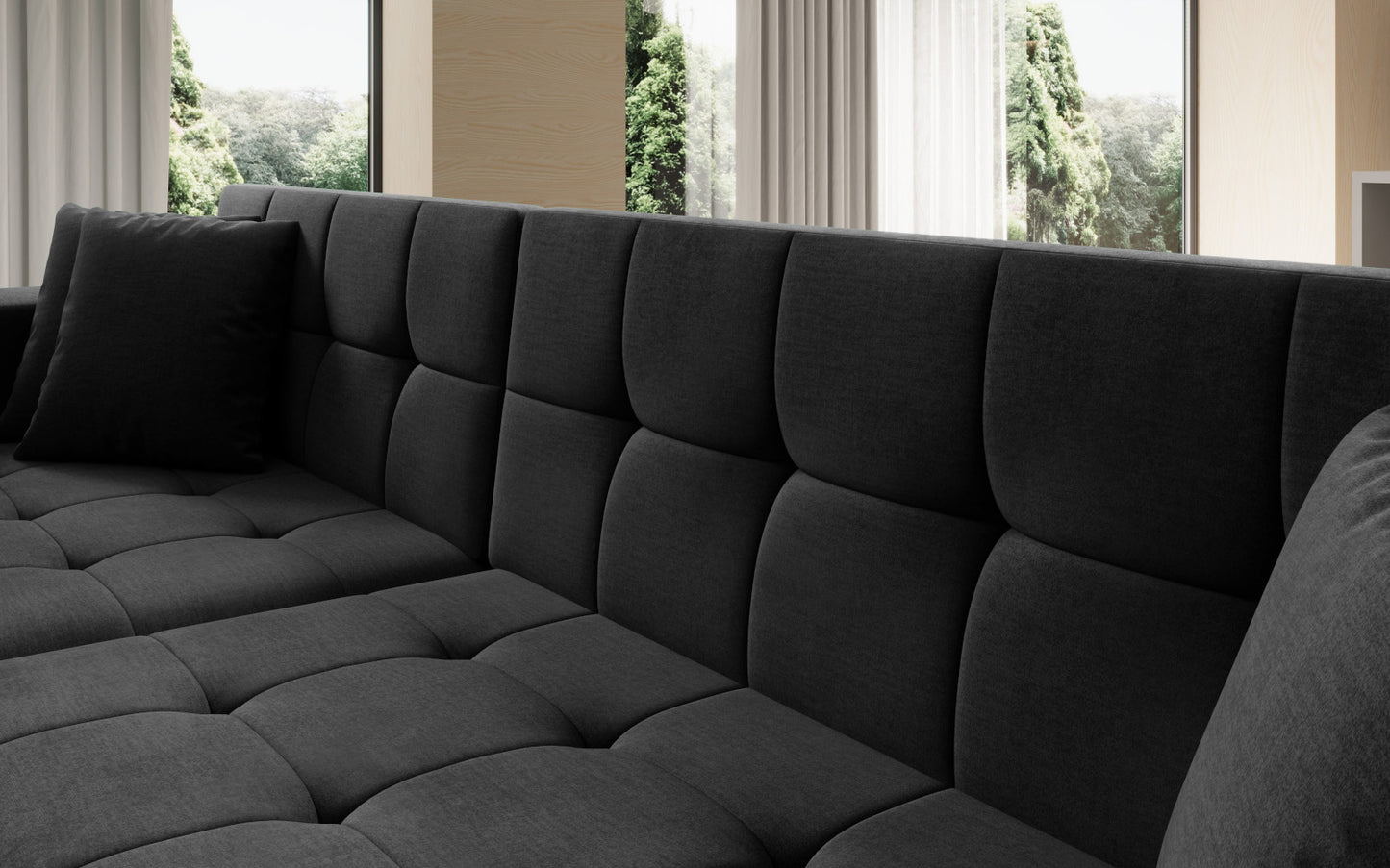 Duży narożnik Solange lewy w tkaninie Monolith 97 w kolorze ciemnoszarym to komfortowa sofa wypoczynkowa, która łączy funkcjonalność z eleganckim i ponadczasowym stylem wnętrza.