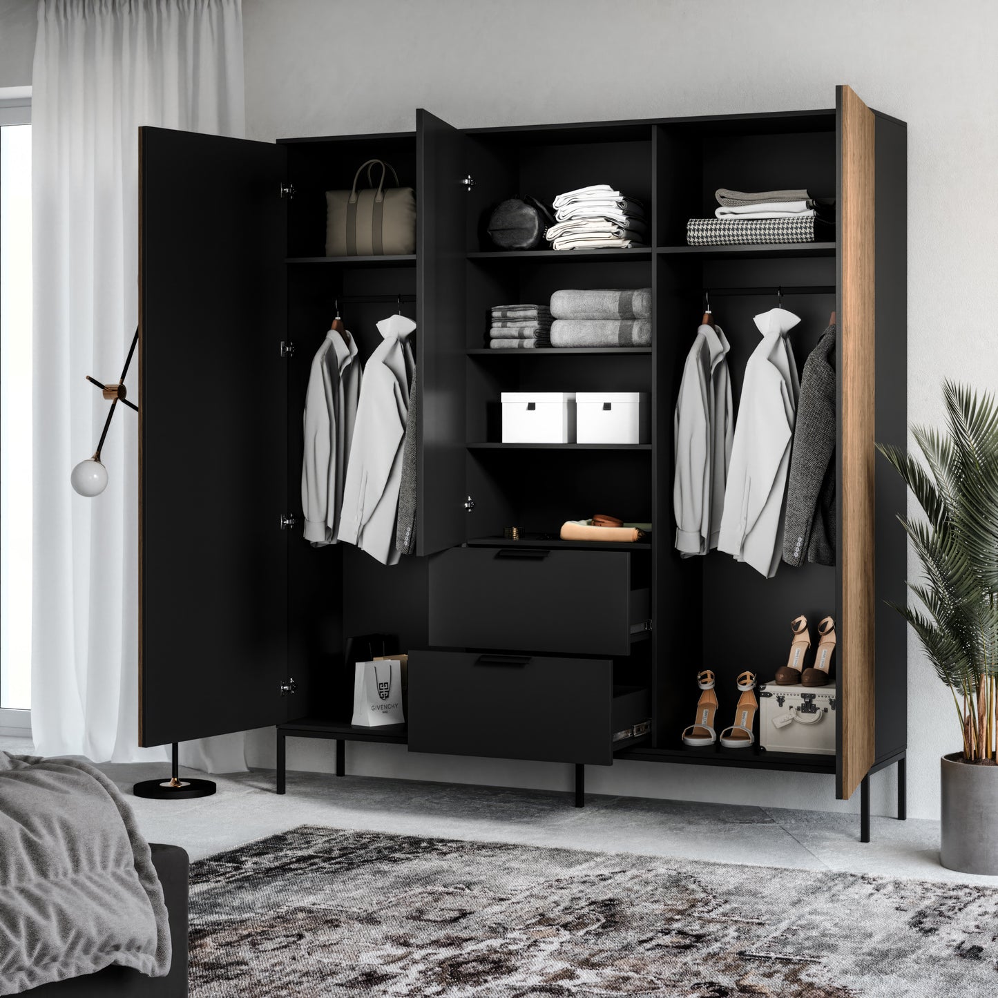 Zbliżenie na uchwyt i front szuflady w szafie Meorati.