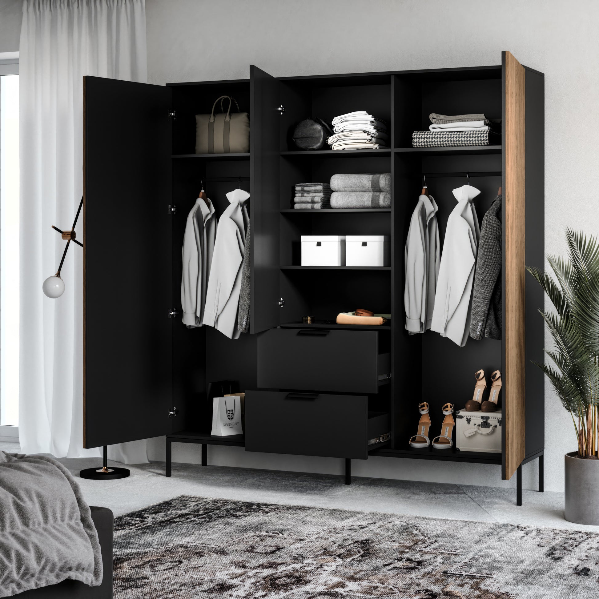 Zbliżenie na uchwyt i front szuflady w szafie Meorati.