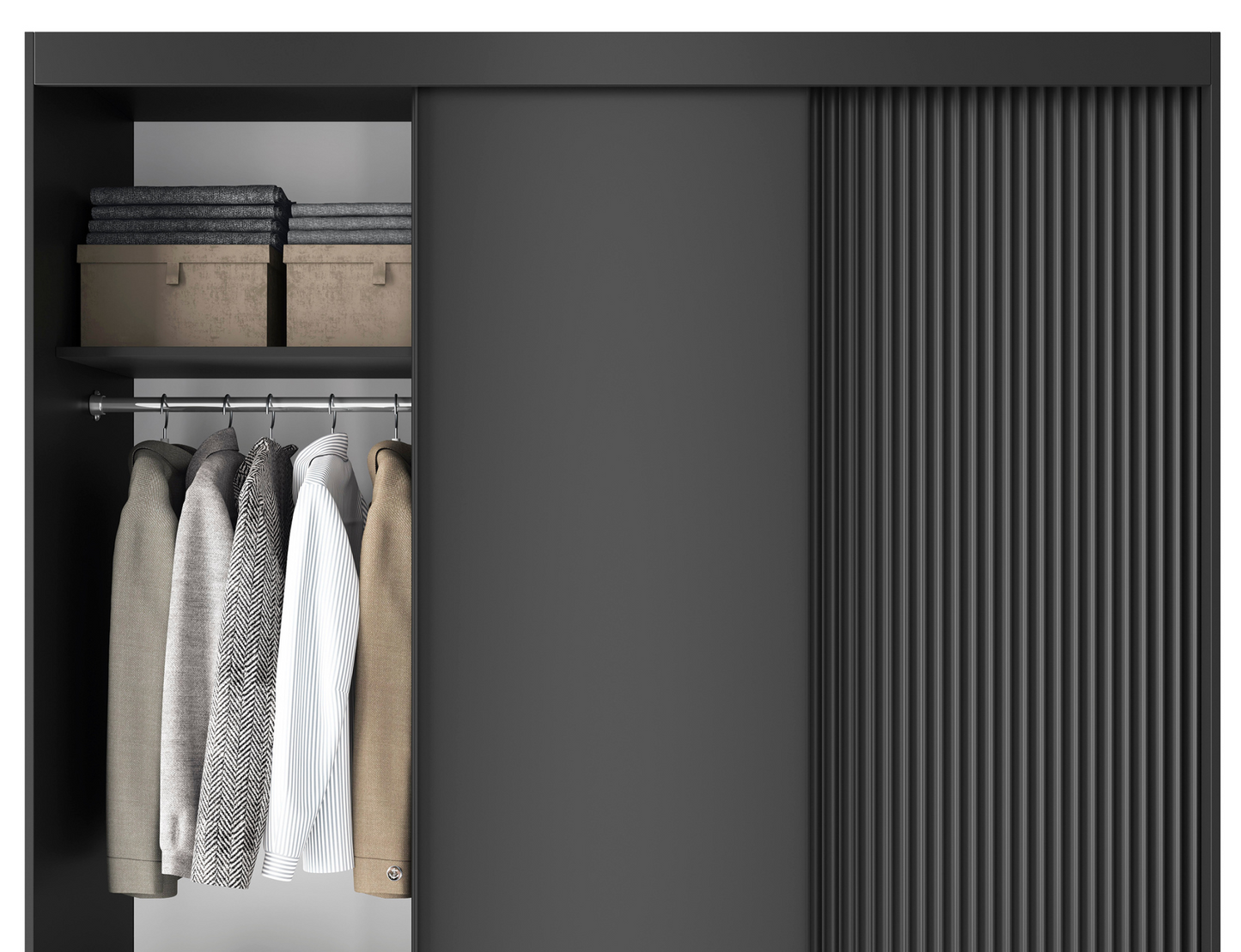 Wnętrze szafy Prescco III czarnej, drążek na ubrania i górna półka.