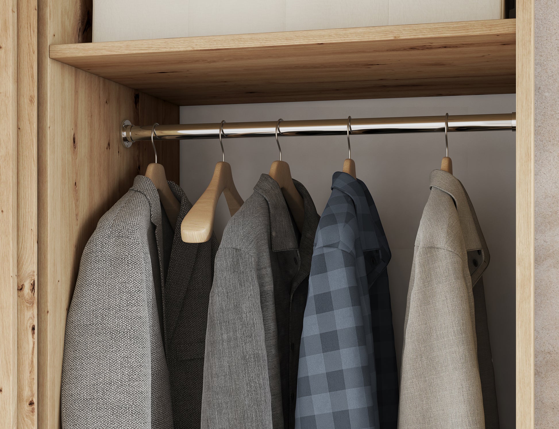 Wnętrze szafy VOODI III z drążkiem i wieszakami, wykończenie w dekorze dąb artisan, praktyczna przestrzeń na ubrania wiszące