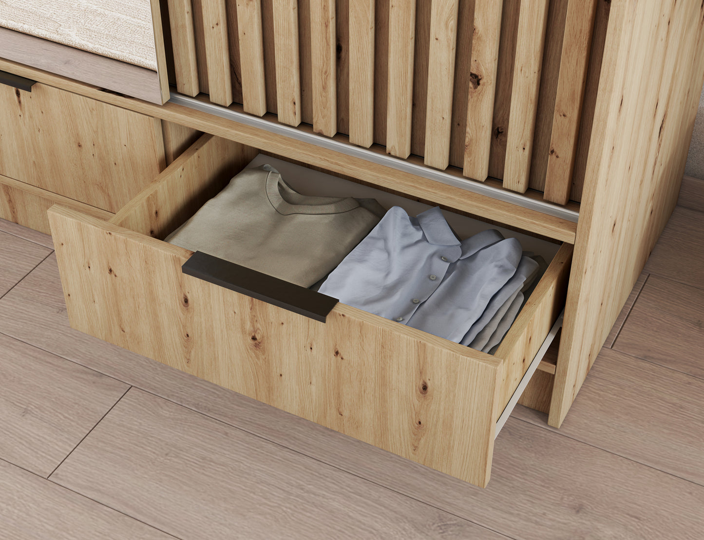 Szuflada szafy VOODI III z uchwytem i ubraniami w środku, wykończenie w kolorze dąb artisan, praktyczny detal w nowoczesnym stylu
