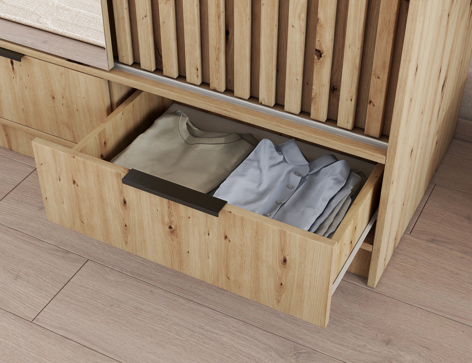 Szuflada szafy VOODI III z uchwytem i ubraniami w środku, wykończenie w kolorze dąb artisan, praktyczny detal w nowoczesnym stylu