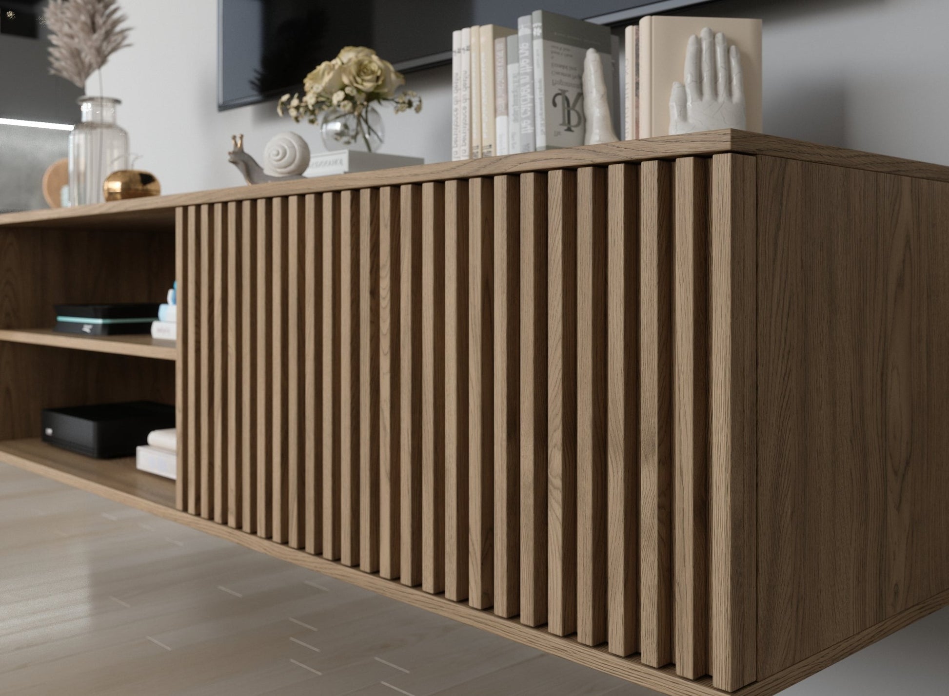 Wisząca szafka RTV Entsian w zestawie mebli – aranżacja wnętrza.