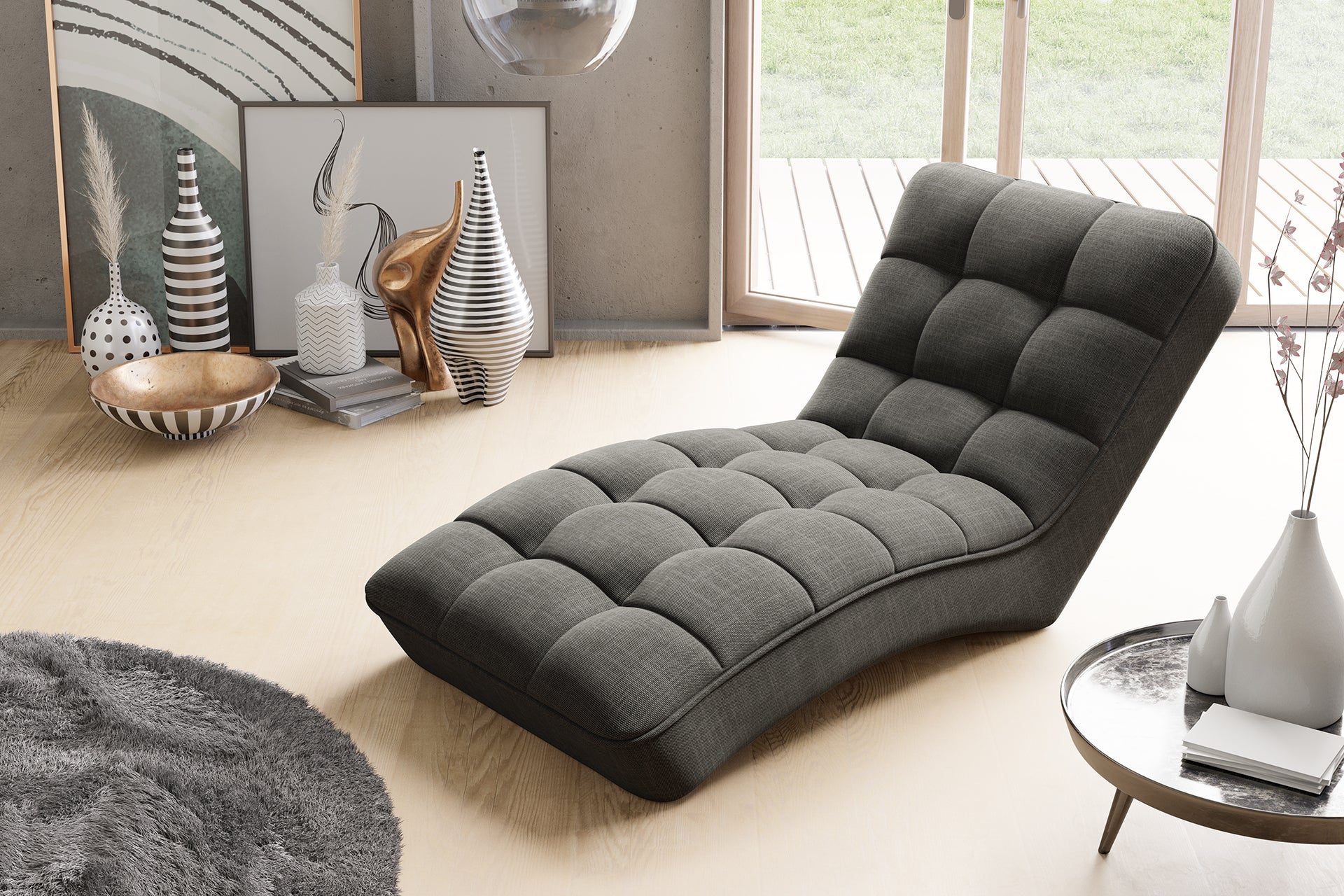 Widok z góry na szezlong Loren Flores 04 w eleganckim salonie z jasną podłogą, dywanem i dekoracyjnymi dodatkami, prezentujący miękkie, pikowane siedzisko.