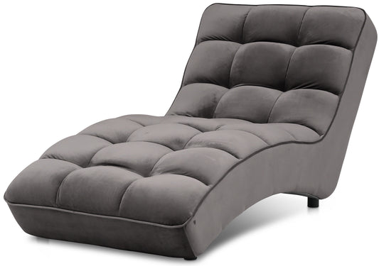 Szezlong Loren w kolorze Riviera 97 (ciemnoszary), sfotografowany na białym tle, prezentujący nowoczesną formę i głębokie pikowania.