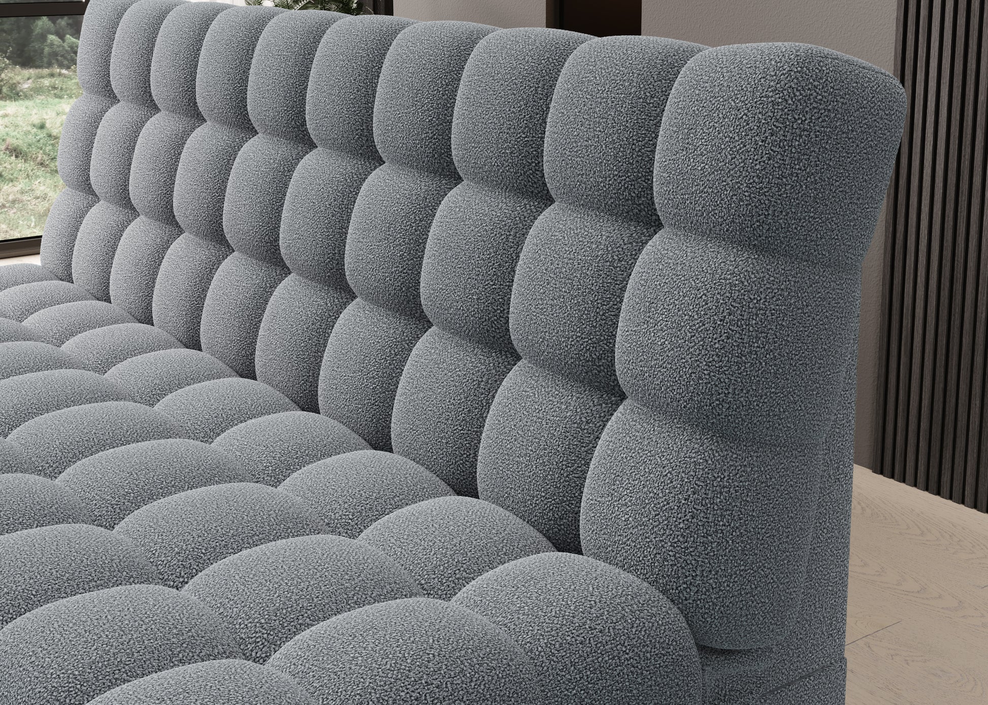 Zbliżenie na pikowane oparcie wersalki Clareta w tkaninie Xillar 04 szary, eksponujące strukturę materiału i nowoczesne wykończenie.