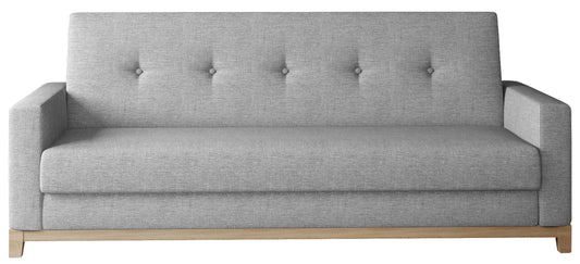 Wersalka Selene w kolorze Sawana 21 szary z drewnianymi nóżkami w odcieniu buk, o prostym i eleganckim designie.