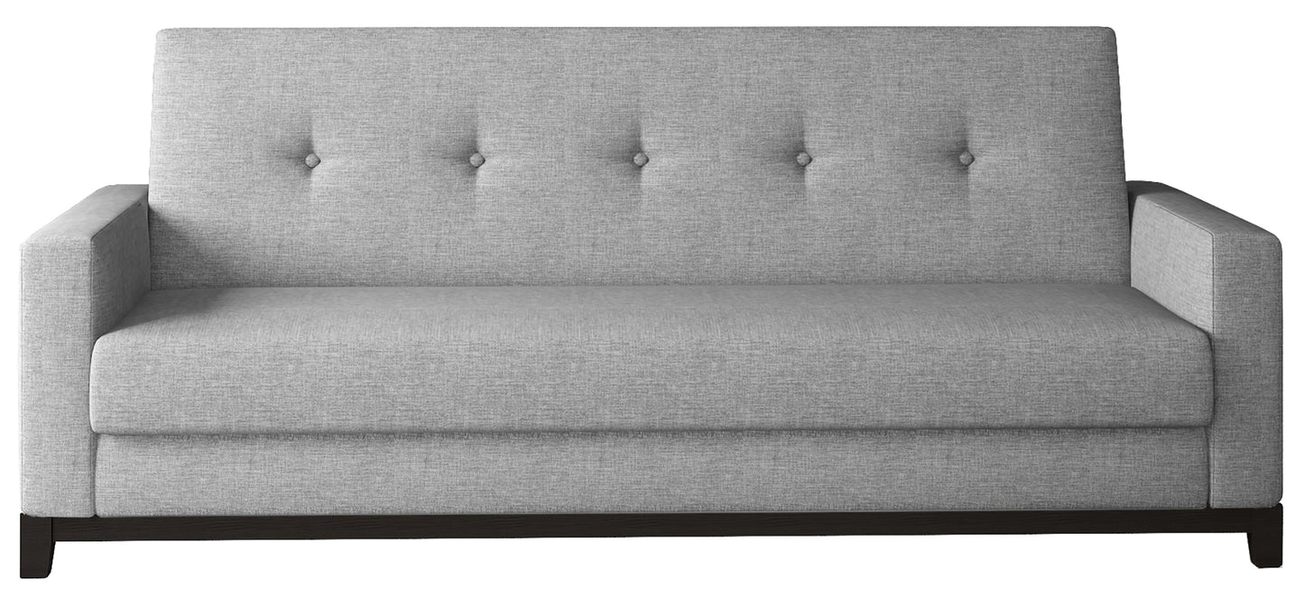 Wersalka Selene w kolorze Sawana 21 szary z drewnianymi nóżkami w odcieniu orzech, o prostym i nowoczesnym designie.