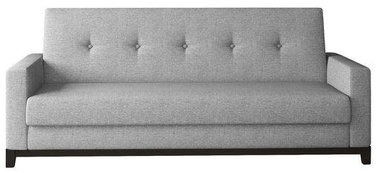 Wersalka Selene w kolorze Sawana 21 szary z drewnianymi nóżkami w odcieniu orzech, o prostym i nowoczesnym designie.