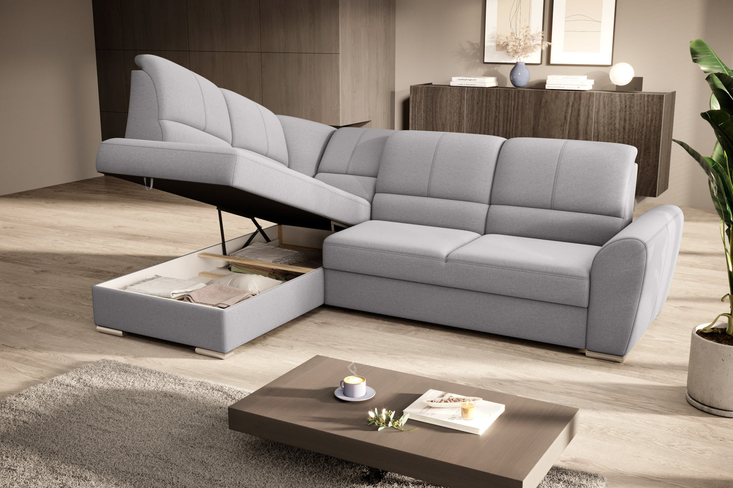 Duży narożnik Siber lewy w tkaninie Gojo 04 w kolorze jasnoszarym to komfortowa sofa wypoczynkowa, która łączy funkcjonalność z eleganckim i uniwersalnym wyglądem wnętrza.