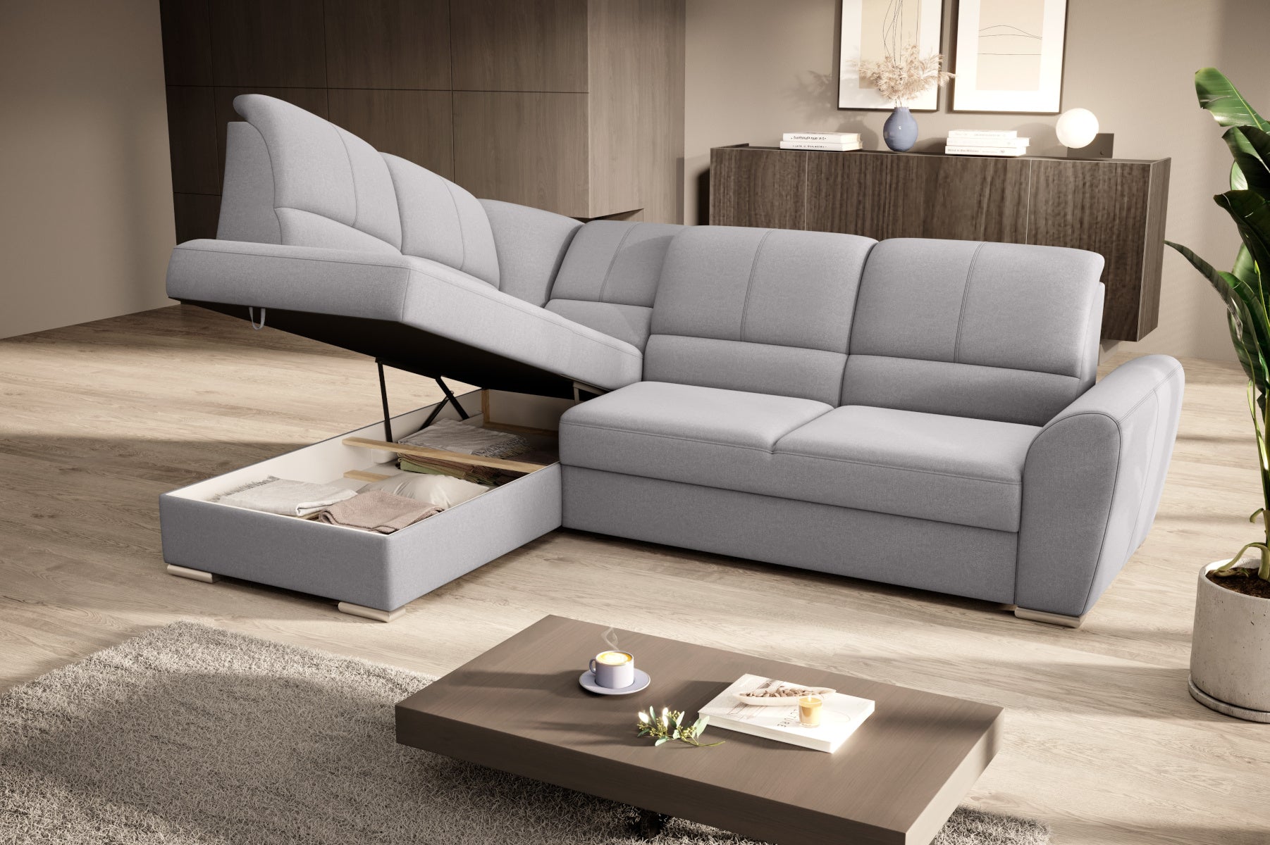 Duży narożnik Siber lewy w tkaninie Gojo 04 w kolorze jasnoszarym to komfortowa sofa wypoczynkowa, która łączy funkcjonalność z eleganckim i uniwersalnym wyglądem wnętrza.