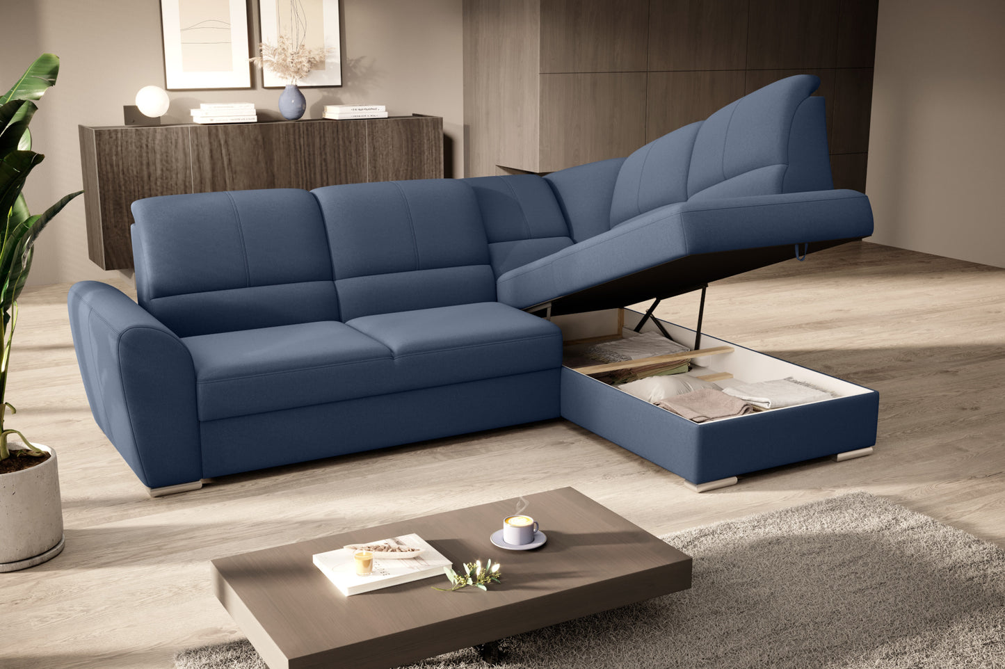 Duży narożnik Siber prawy w tkaninie Gojo 40 w kolorze niebieskim to komfortowa sofa wypoczynkowa do salonu, która łączy funkcjonalność z uniwersalnym i stylowym wyglądem.