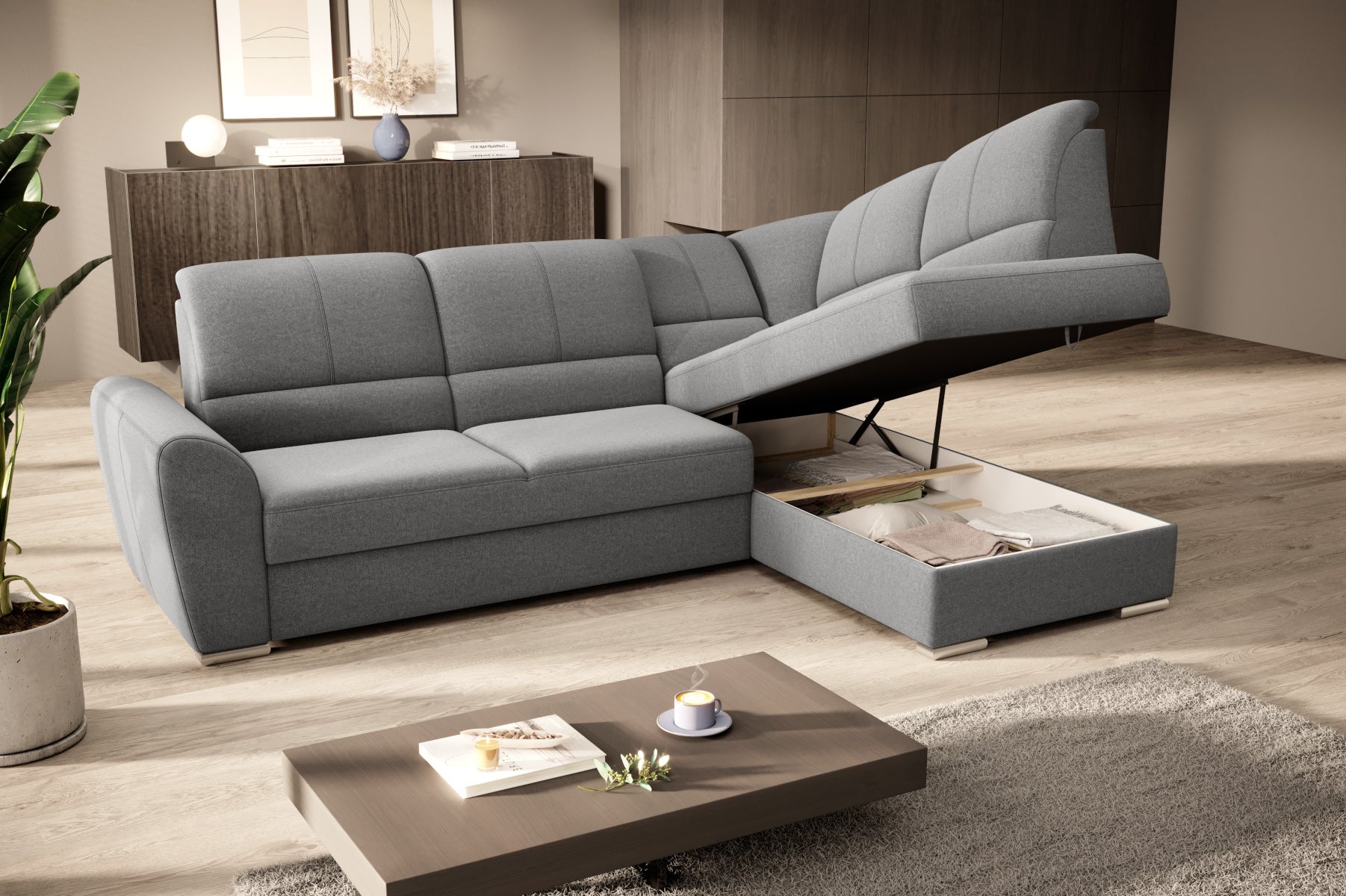 Duży narożnik Siber prawy w tkaninie Gojo 05 w kolorze szarym to komfortowa sofa wypoczynkowa do salonu, która łączy funkcjonalność z eleganckim i uniwersalnym stylem.