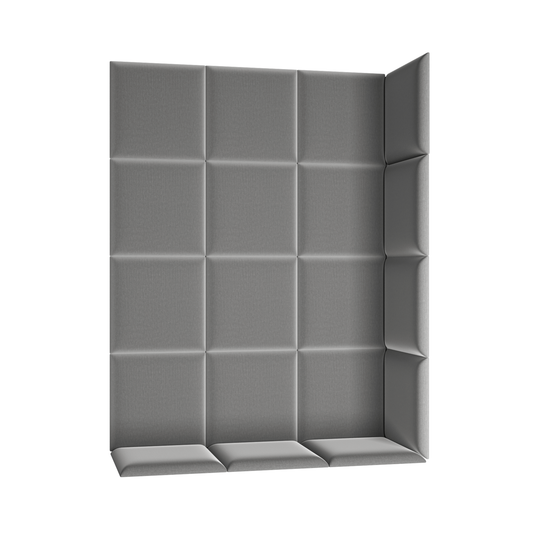 L-kształtna aranżacja pionowych paneli akustycznych Quadratta III Monolith 85 w stonowanym szarym odcieniu, tworząca elegancką narożnikową kompozycję z równomiernie rozmieszczonymi, miękkimi segmentami.