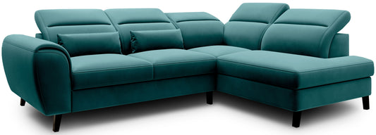 Zielony narożnik Noble prawy w tkaninie Velvetmat 38 z regulowanymi zagłówkami oraz eleganckim welurowym wykończeniem. Stylowy narożnik do salonu idealny do wnętrz glamour, modern classic i loftowych aranżacji.