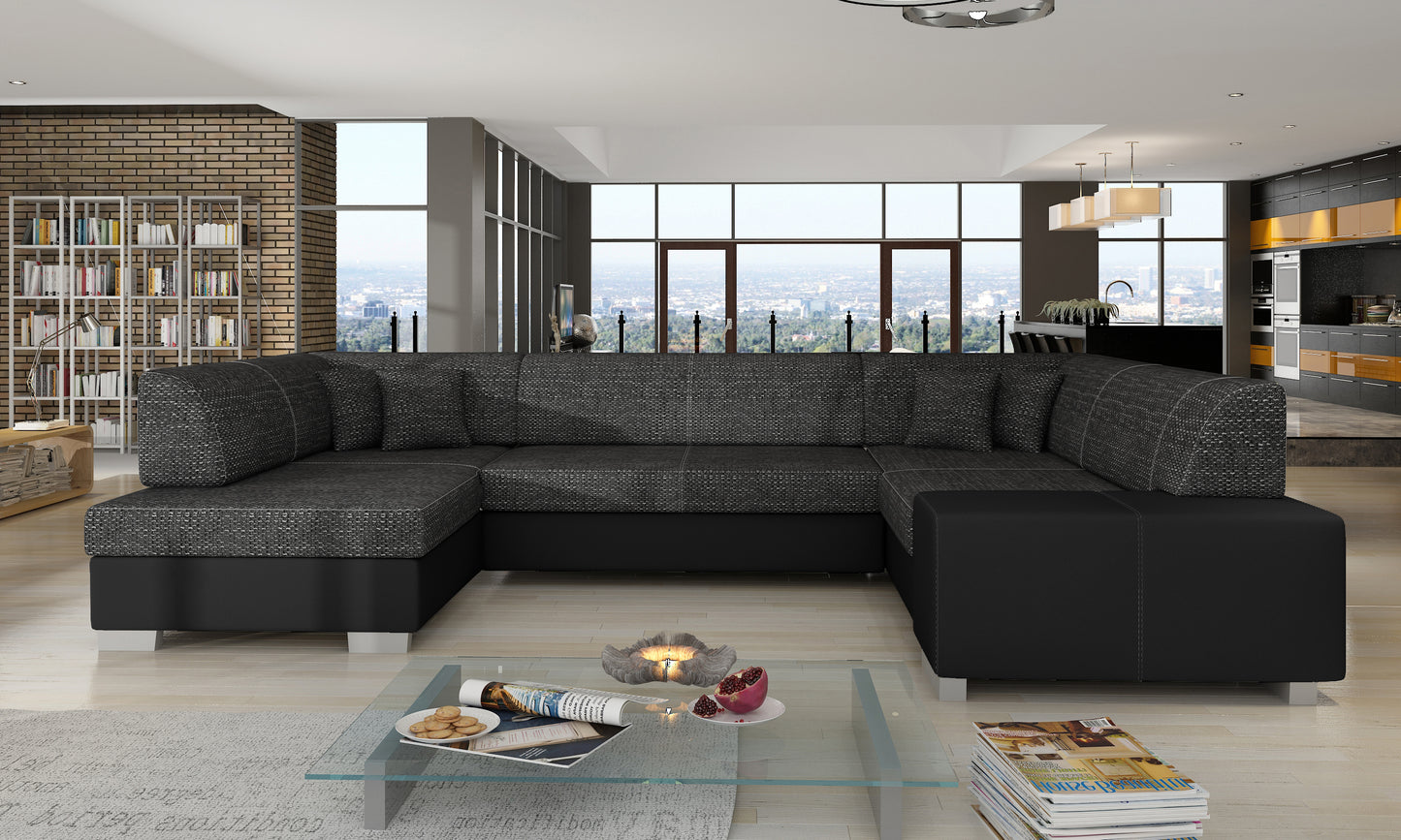 Czarny narożnik Havana w tkaninie Berlin 02 i Soft 11 ustawiony w eleganckim, przestronnym salonie