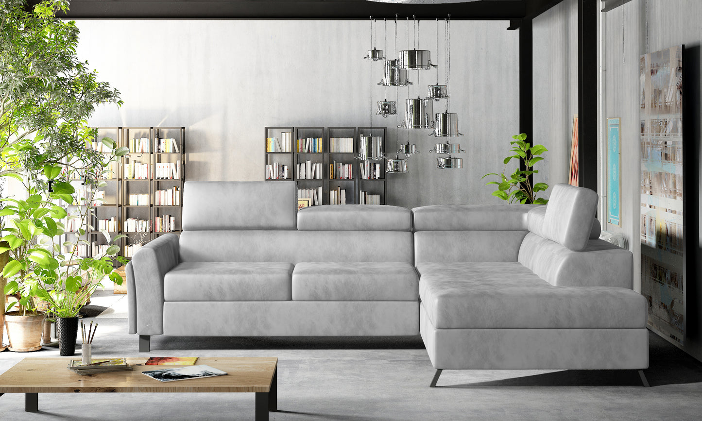 Sofa narożna Kairos Monolith 84 jasnoszara z prawym układem wypoczynkowym oferuje dużą przestrzeń do relaksu, elegancką formę i ponadczasowy styl do rodzinnego pokoju dziennego.