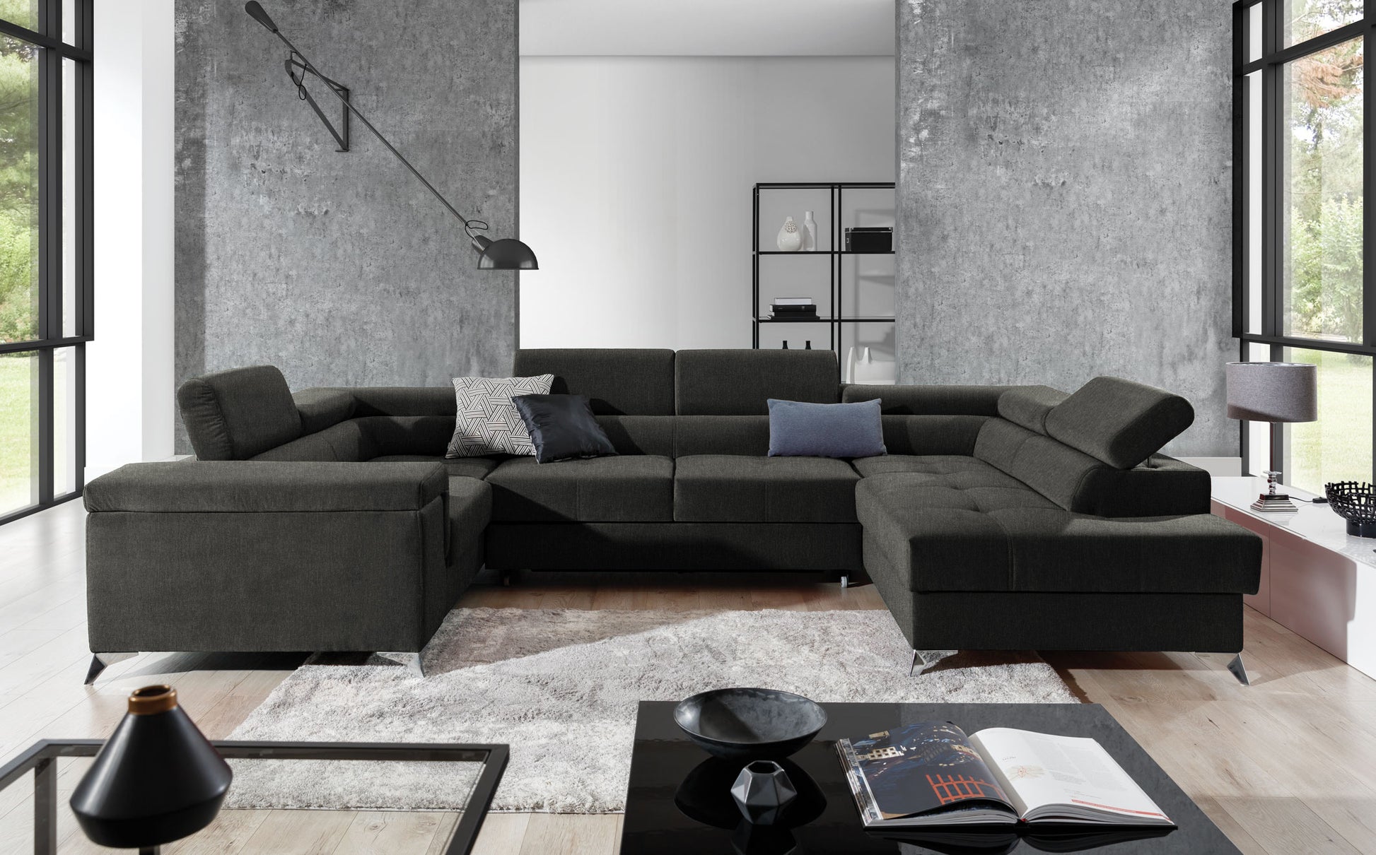 Nowoczesny narożnik Thiago w kolorze ciemnoszarym z eleganckimi metalowymi nóżkami i szerokimi siedziskami doskonale sprawdzi się w salonie urządzonym w stylu loftowym, minimalistycznym lub industrialnym. Stylowy narożnik do nowoczesnych wnętrz łączy wygodę z funkcjonalnością.