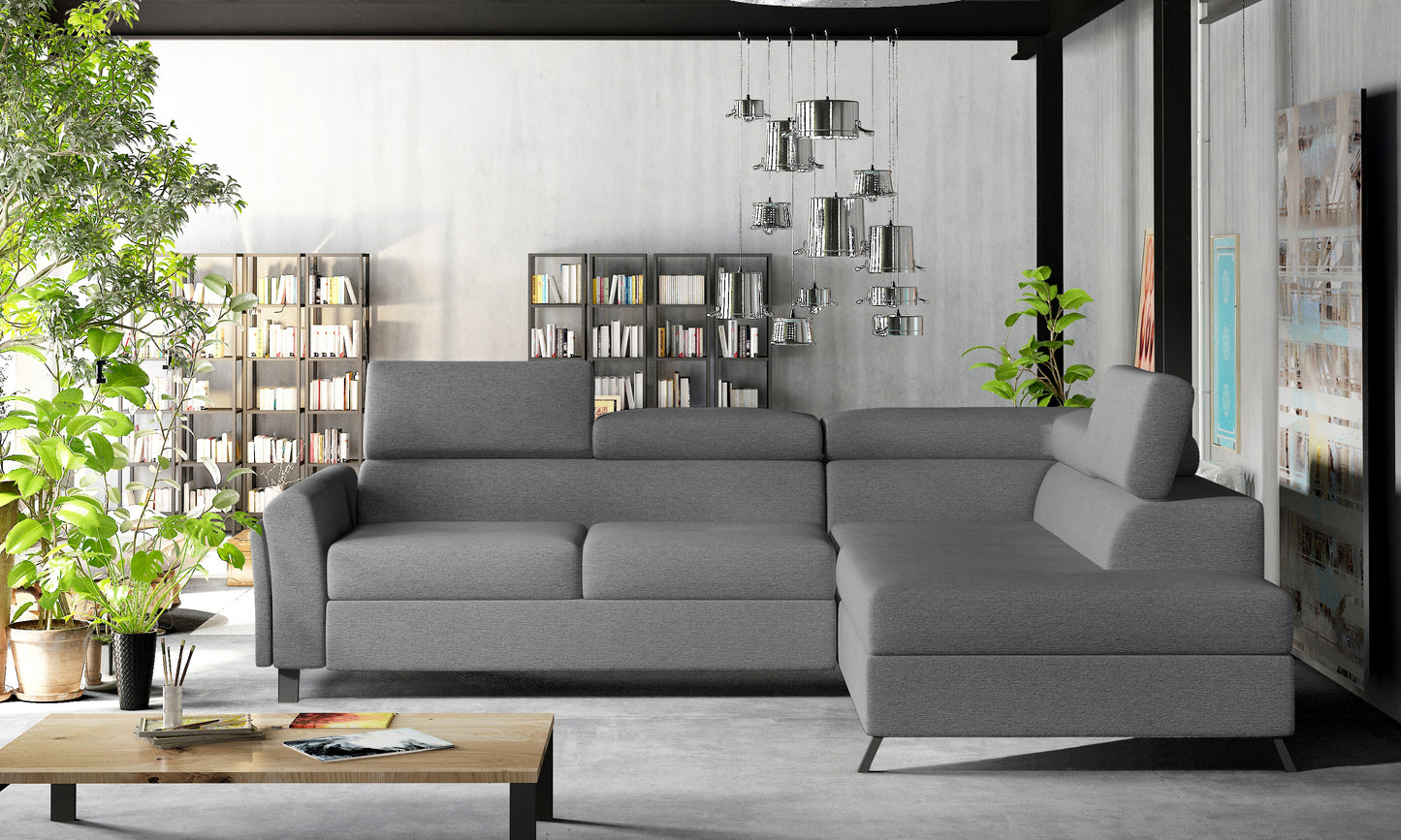 Sofa narożna Kairos Primo 96 ciemnoszara z prawym układem wypoczynkowym oferuje dużą powierzchnię siedzenia, spokojną linię mebla i praktyczne rozwiązanie do przestronnego pokoju dziennego.