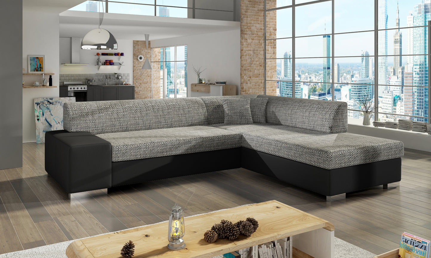 Szaro-czarna sofa narożna Porto wykonana z materiałów Berlin 01 oraz Soft 11 doskonale wpisuje się w aranżacje loftowe i nowoczesne, oferując komfortowe siedziska i estetyczny design dopasowany do wnętrza