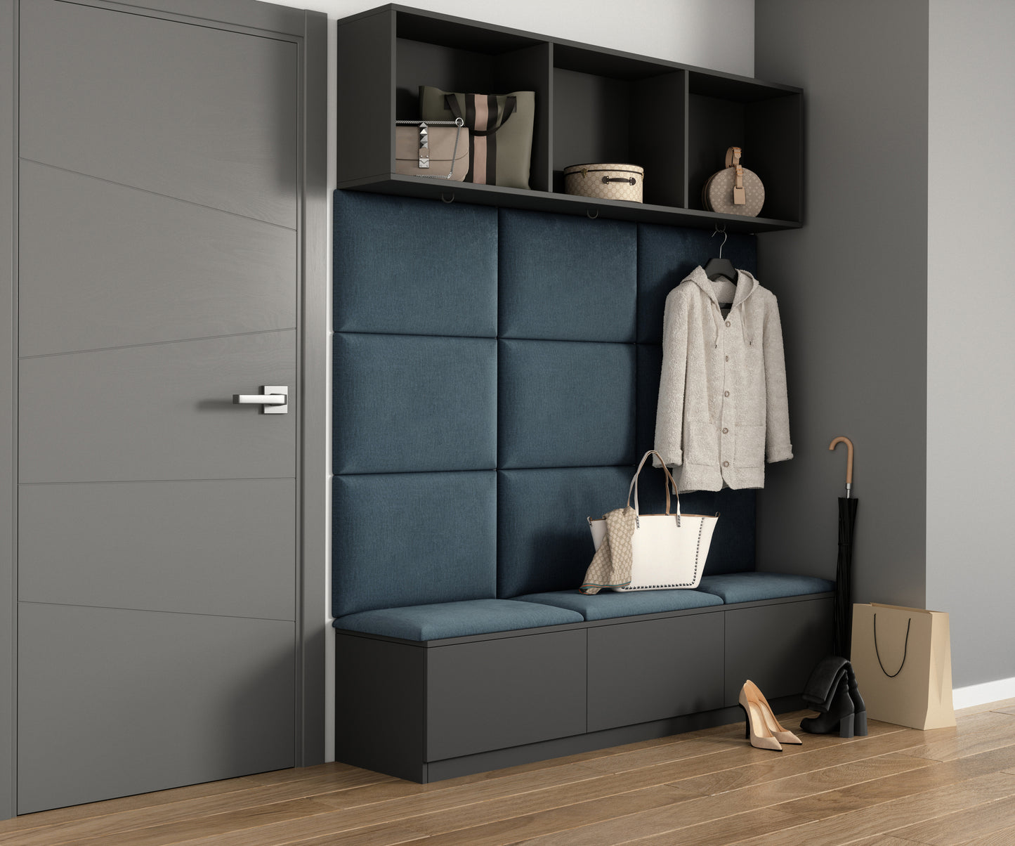 Nowoczesna wnęka przedpokoju z czarną ławką, metalowymi haczykami i półką na torby; za ławką znajduje się jasnoniebieski panel akustyczny Quadratta VI Monolith 76 z poziomymi pasami.