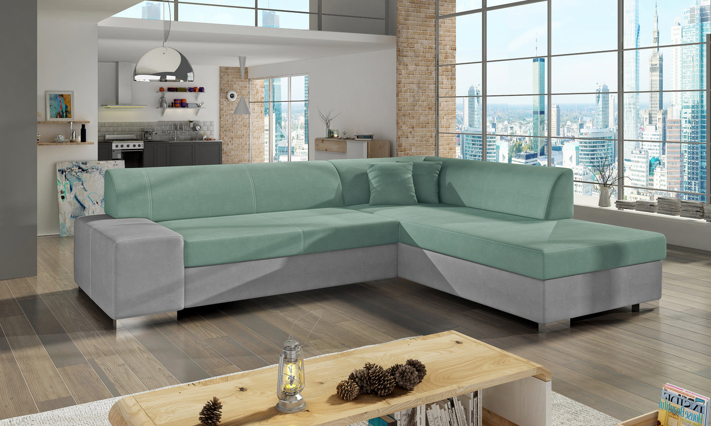 Zielono-szara sofa narożna Porto wykonana z materiałów Soro 34 i Soro 83 w układzie prawym doskonale sprawdzi się w nowoczesnych aranżacjach, zapewniając komfort użytkowania oraz estetyczny wygląd dopasowany do wnętrza